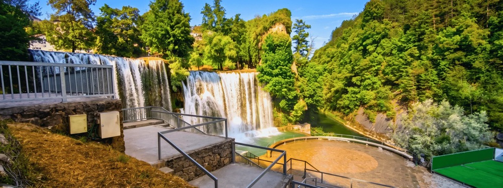 Jajce waterfall and historic buildings
